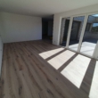 Wohnzimmer - Exklusive Penthouse-Wohnung mit Dachterrasse und PKW-Stellplatz