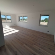 Wohnzimmer - Exklusive Penthouse-Wohnung mit Dachterrasse und PKW-Stellplatz