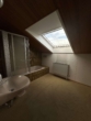 Badezimmer - Familienfreundliches Einfamilienhaus mit Parkmöglichkeit und Garten