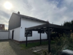 Hausansicht - Familienfreundliches Einfamilienhaus mit Parkmöglichkeit und Garten